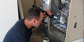 ASAP Home Inspections - Inspecting hot water pipes.