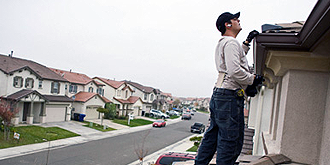 ASAP Home Inspections - Inspecting the roof.